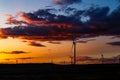 Aug 2017 Ã¢â¬â Xinjiang, China Ã¢â¬â Wind Turbines at sunset in Burqin County, North of Xinjiang